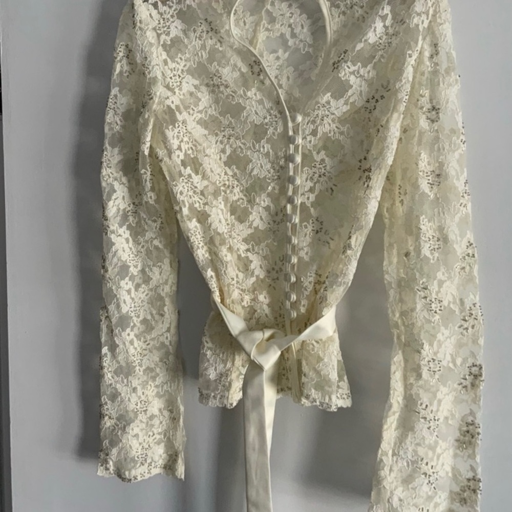 Beautiful lace and bugle beads with satin sash & trim. Size 8